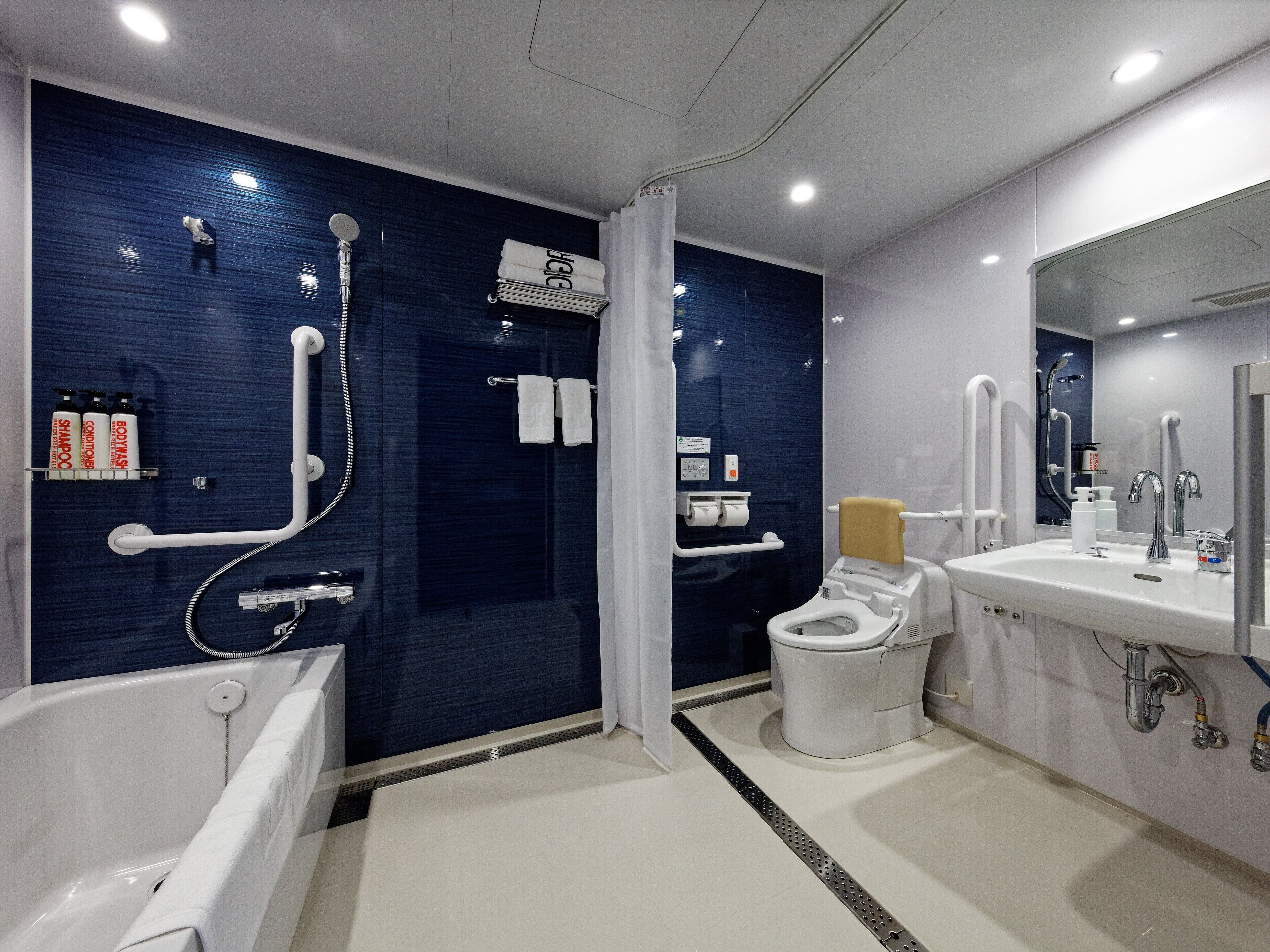 universal twin room, 2 double beds and 1 sofa bed, non smoking | bathroom | combined shower/bathtub, free toiletries, hair dryer, slippers