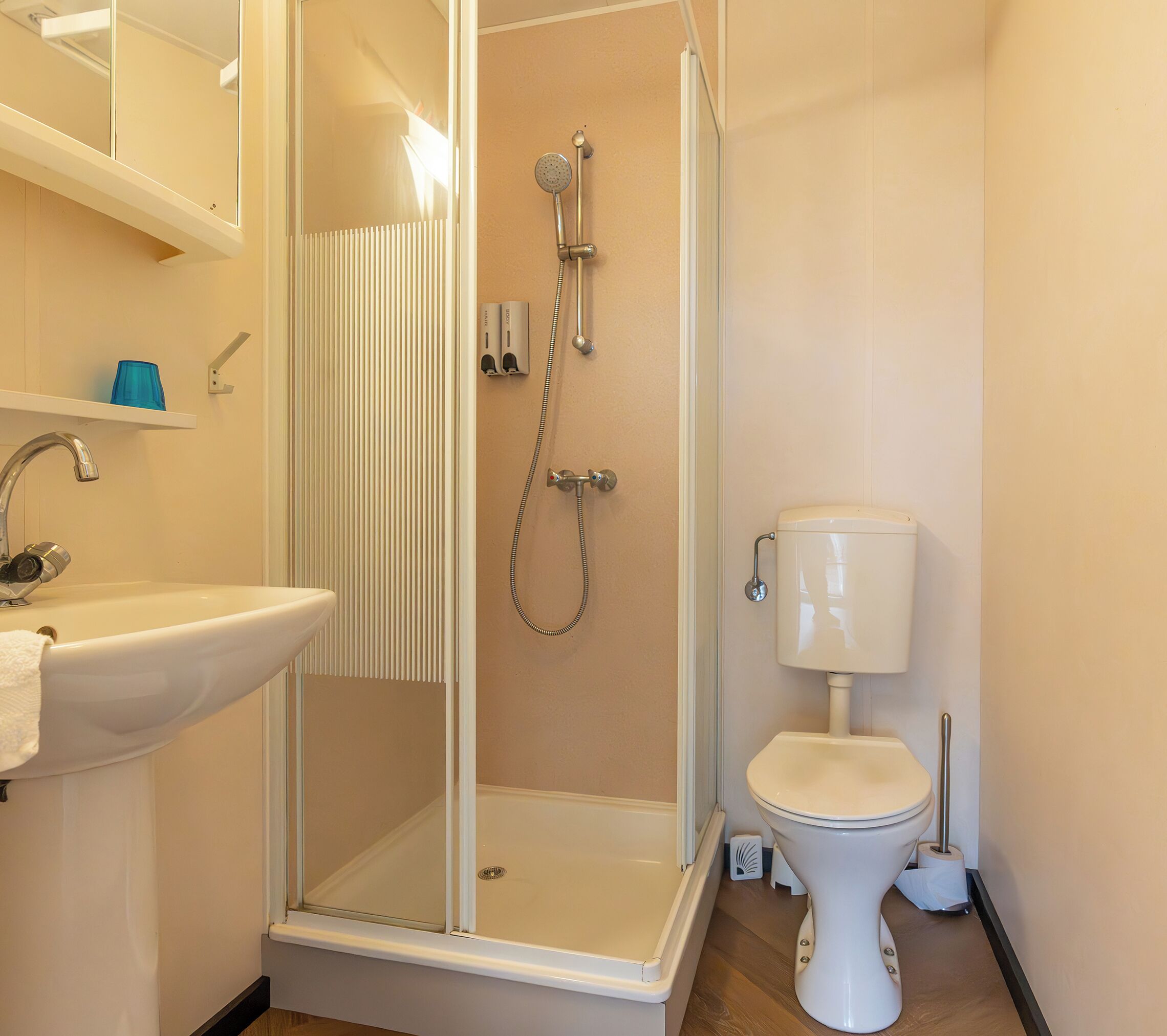 deluxe double room (terra mare) | bathroom | shower, hair dryer, soap, shampoo