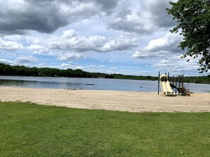 Stroll along the lake's edge and enjoy the playground's fun features.