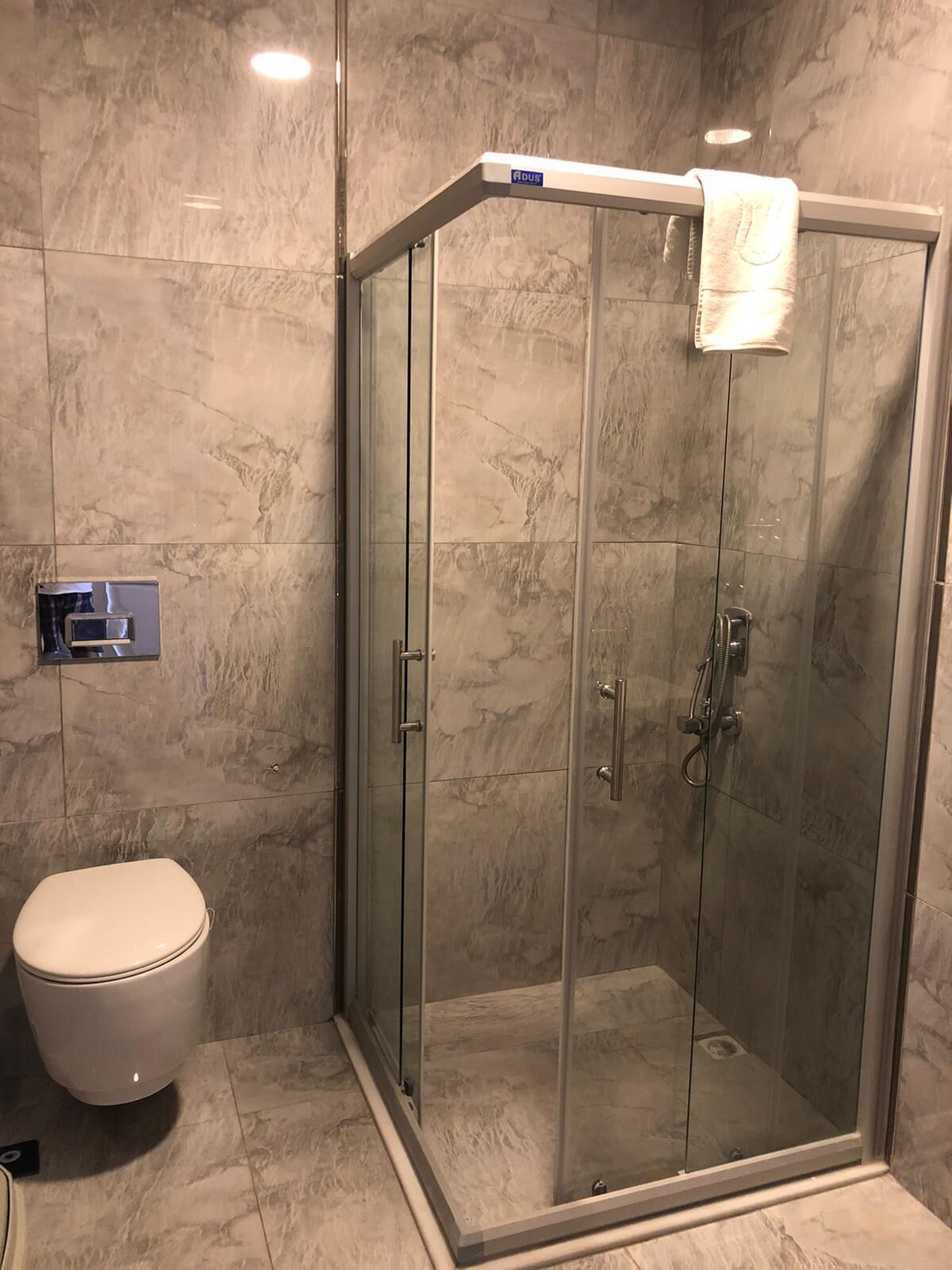 shower, rainfall showerhead, hair dryer, slippers