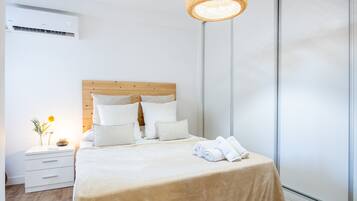 2 slaapkamers, een strijkplank/strijkijzer, reisbedje, gratis wifi