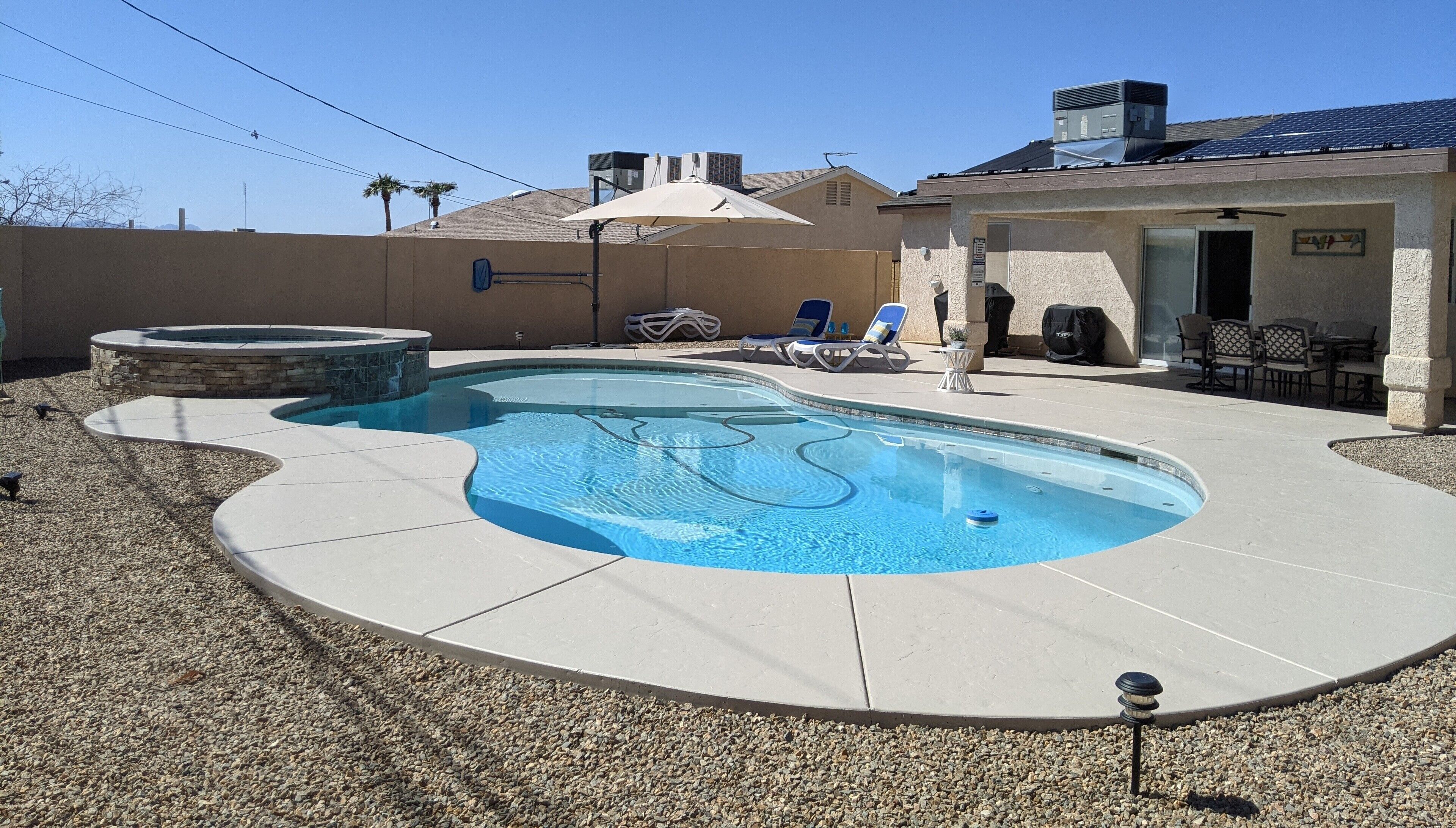 Beat the heat in a private pool w/ large baja shelf! Many amenities to enjoy! 