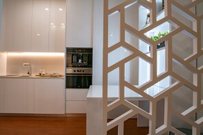 Appartement Deluxe, vue sur la ville | Cuisine privée | Cafétière à espresso, cafetière-théière, bouilloire électrique
