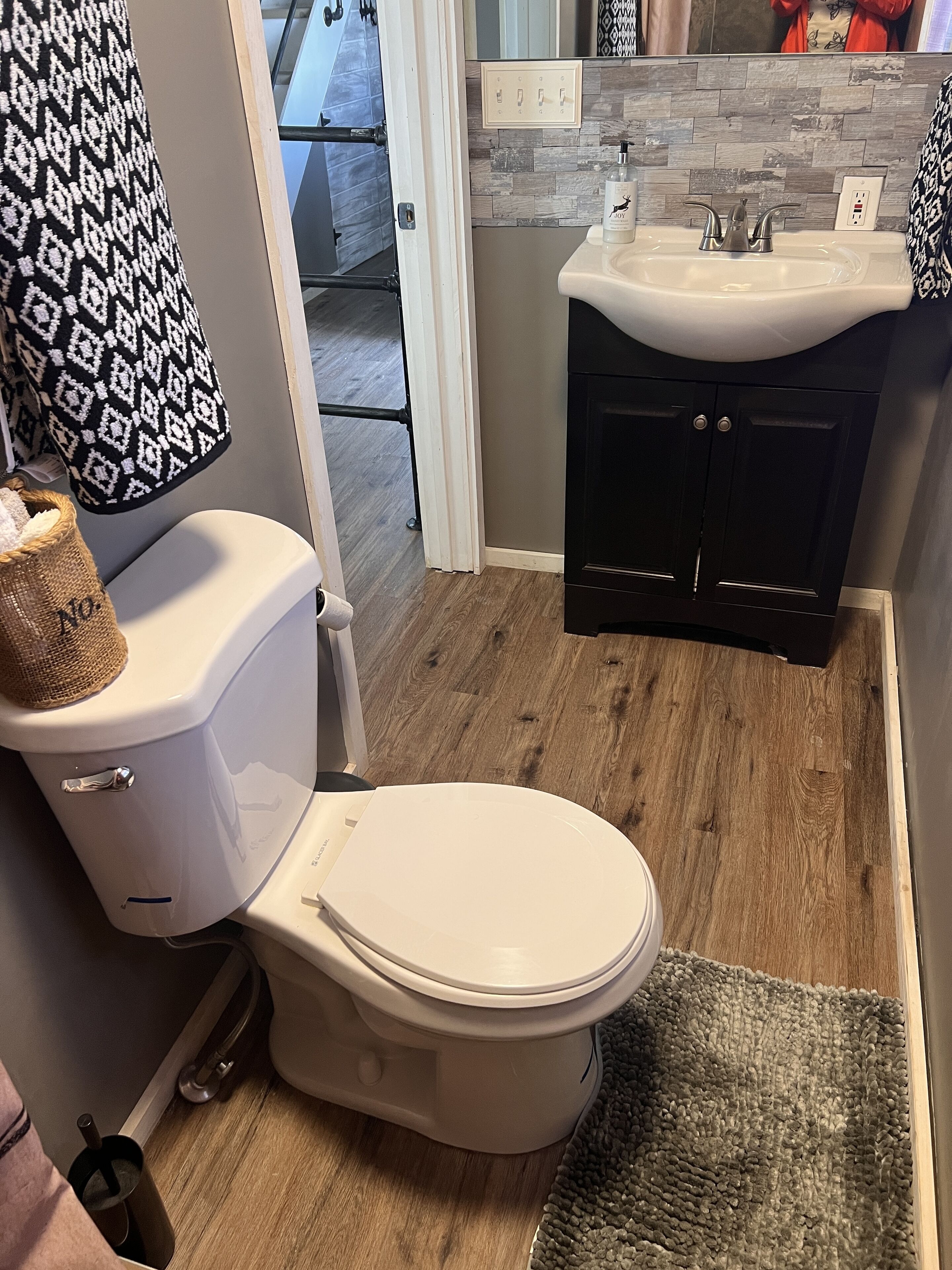 Shower, towels, soap, toilet paper