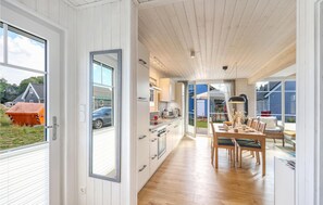 Fridge, stovetop, dishwasher, coffee/tea maker