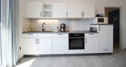 Strandnahe kinderfr. Fewo mit Balkon+Terrasse,Sauna,Wallbox, u. Waschmaschine