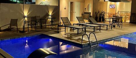 Outdoor pool, open 8:00 AM to 10:00 PM, sun loungers