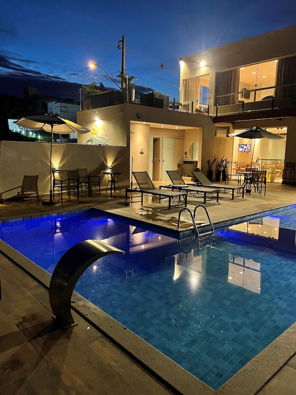 Outdoor pool, open 8:00 AM to 10:00 PM, pool loungers