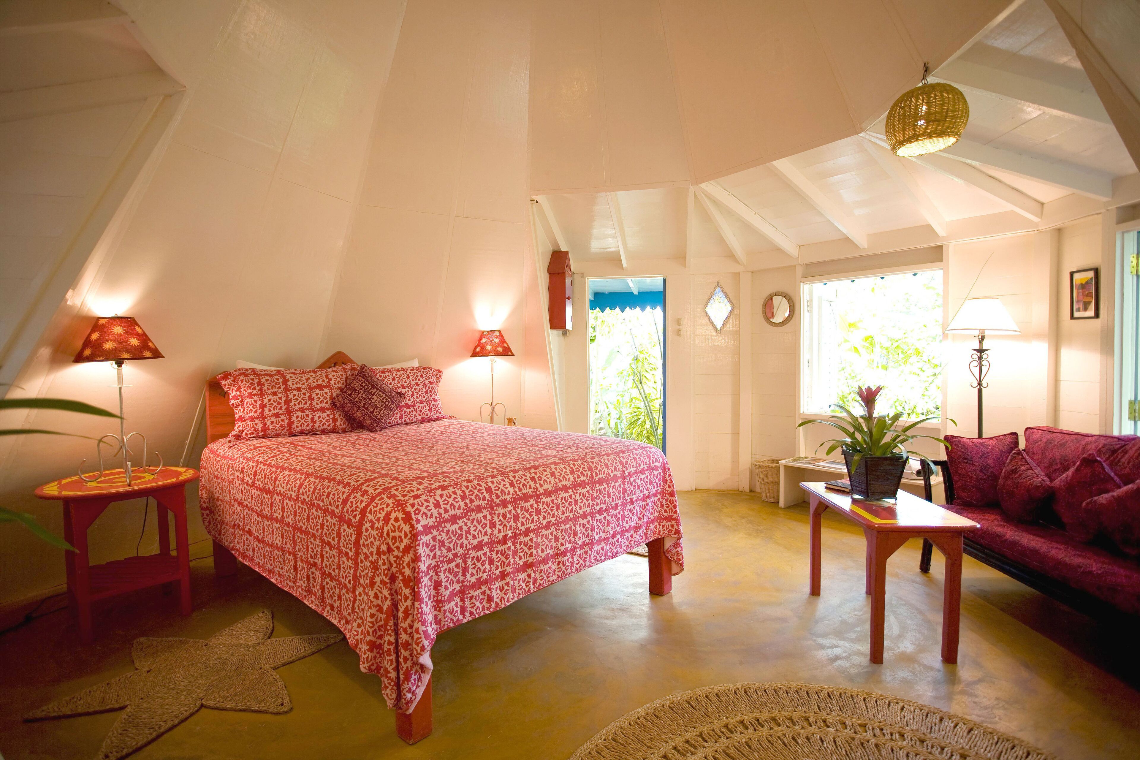 deluxe room, 1 queen bed (one bedroom garden view cottage) | 1 bedroom, free minibar, in-room safe, individually decorated