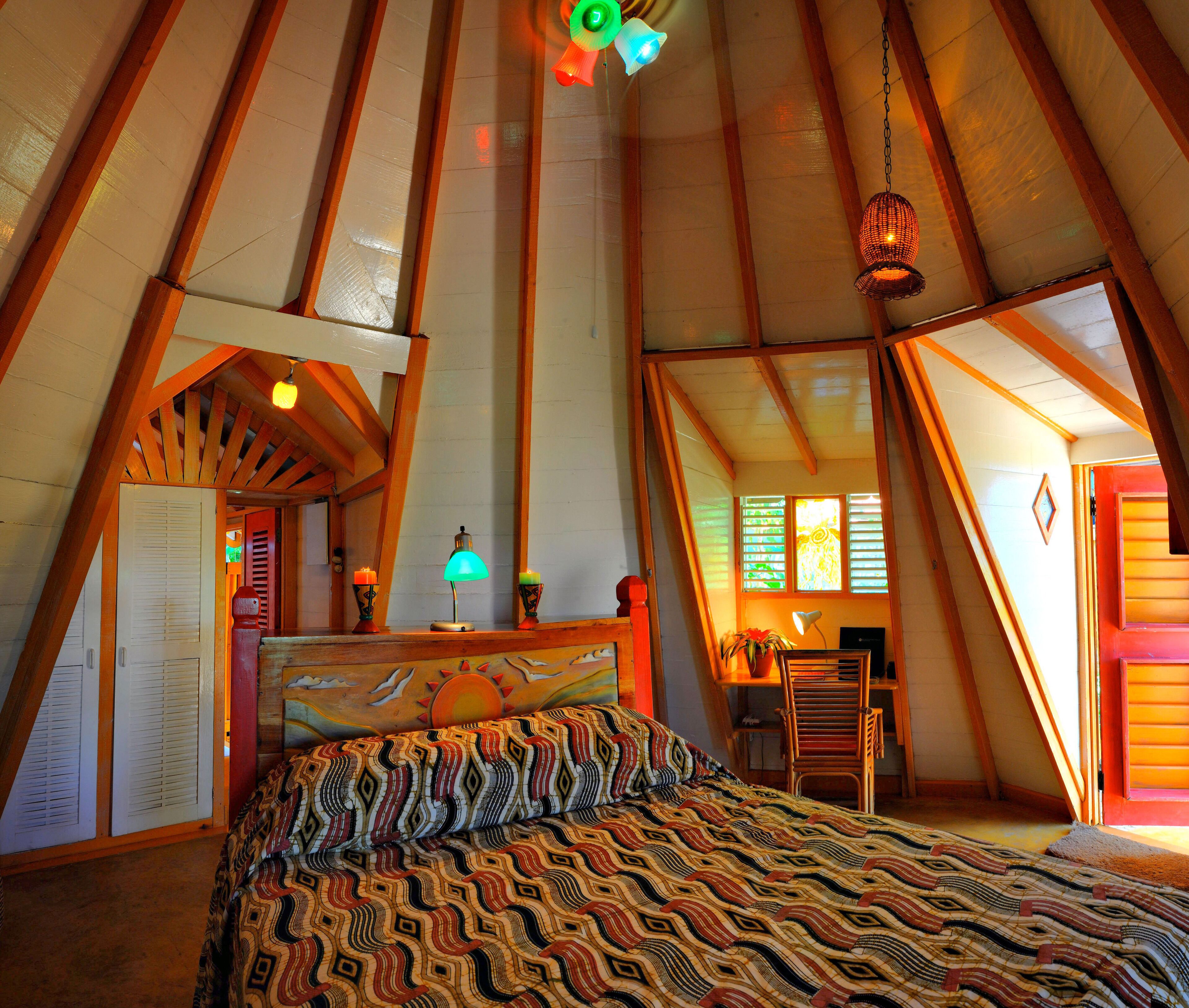 deluxe room, 1 queen bed (one bedroom partial ocean view cottag) | 1 bedroom, free minibar, in-room safe, individually decorated