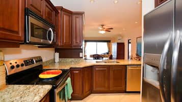 Condo, 2 Bedrooms | Private kitchen | Full-sized fridge, microwave, stovetop, dishwasher