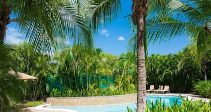 Nicely Decorated Ground-floor Unit in Front of Pool at Pacifico in Coco