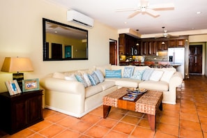 Living room - Elegant 3BR Beachfront Condo with Spacious Interior, Ocean-View Terrace & Direct Access to Playa Flamingo (Cabo Velas)