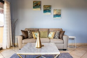 Living room - Modern - immaculate unit in Flamingo with spectacular ocean views (Cabo Velas)