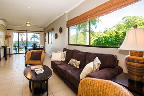 Living room - Beautiful Condo in Peaceful Cliffside Location with a Private Balcony & Stunning Ocean and Mountain Views (Cabo Velas)
