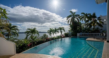 Dreamy Spanish-Style Villa with Sweeping Ocean Views, Elegant Nautical Design & Giant Infinity Pool