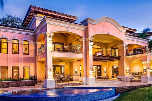 Luxurious Beachfront Mansion with a Stunning Infinity Pool in Playa Flamingo