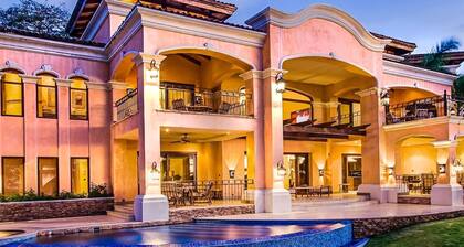 Luxurious Beachfront Mansion with a Stunning Infinity Pool in Playa Flamingo