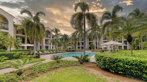 Outdoor pool - Spacious One-Bedroom Condo with Pool View, Balcony & Beach Club Access (Sardinal)