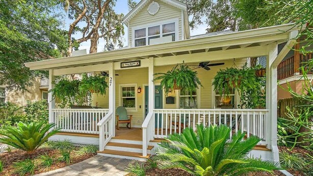 A house with a porch, a sign reading 'Cedar DeSoto,' and a mailbox. - Casa DeSoto - Luxury Downtown Oasis (St. Augustine)
