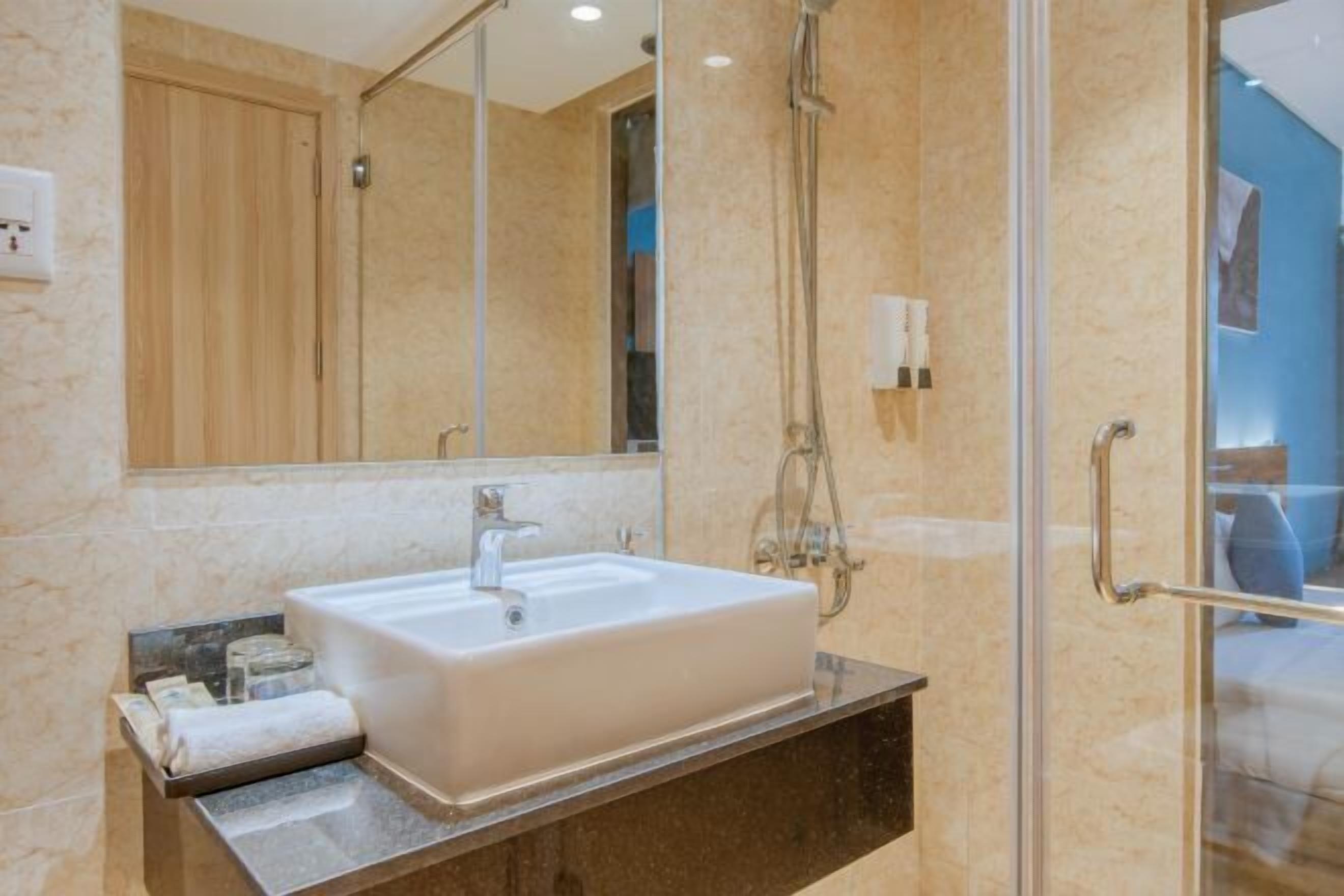 Bathroom | Shower, hair dryer, bathrobes, slippers