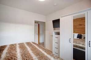 1 chambre, fer et planche à repasser, accès au Wi-Fi (inclus)