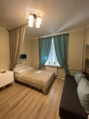 Rideaux occultants, fer et planche à repasser, Wi-Fi gratuit