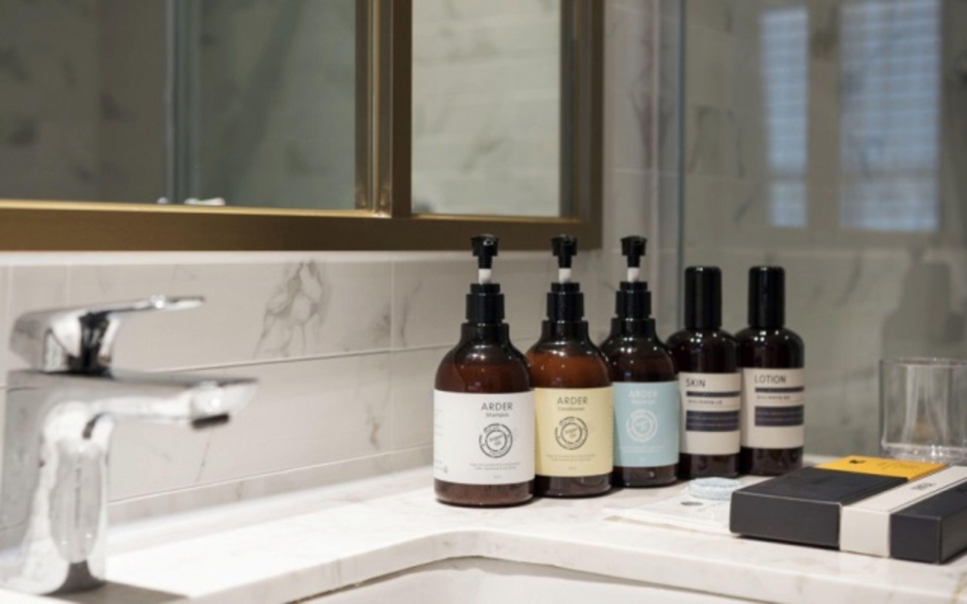 bathrobes, towels, soap, shampoo