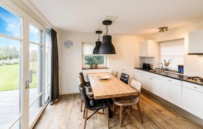 Fridge, stovetop, dishwasher, coffee/tea maker