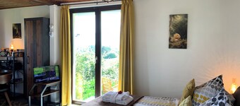 Vacation home "Am Hermannstein" with panoramic view and garden. Vacation with a dog.