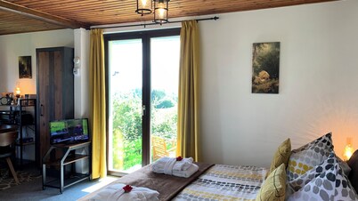 Vacation home "Am Hermannstein" with panoramic view and garden. Vacation with a dog.