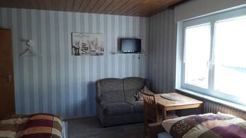 3 habitaciones, tabla de planchar con plancha, cuna de viaje y wifi