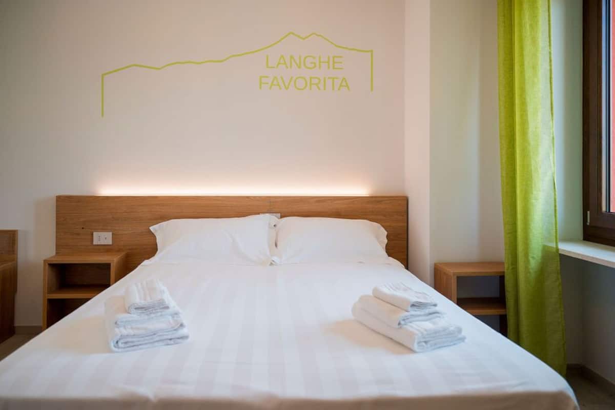 Desk, laptop workspace, free WiFi, bed sheets