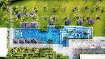 Outdoor pool, open 6:00 AM to 10:00 PM, sun loungers