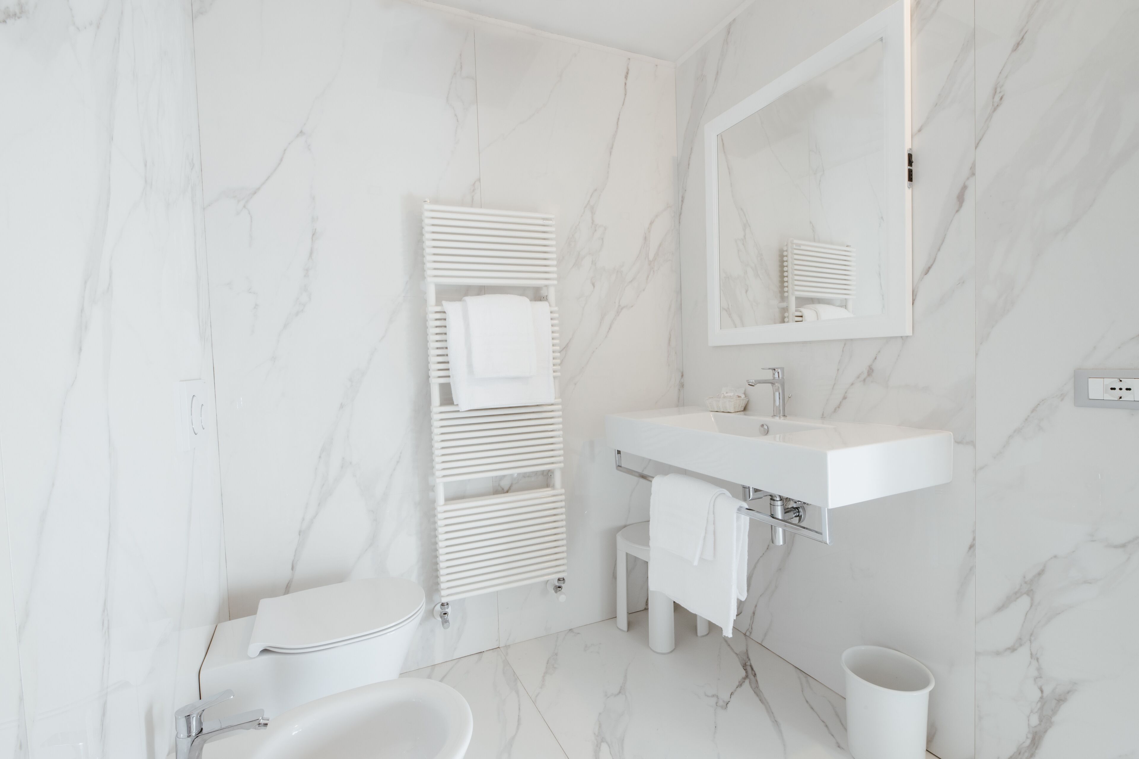 shower, hair dryer, slippers, bidet