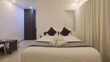 Egyptian cotton sheets, premium bedding, down duvets, memory-foam beds