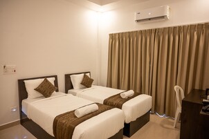 Twin Room | Egyptian cotton sheets, premium bedding, down comforters