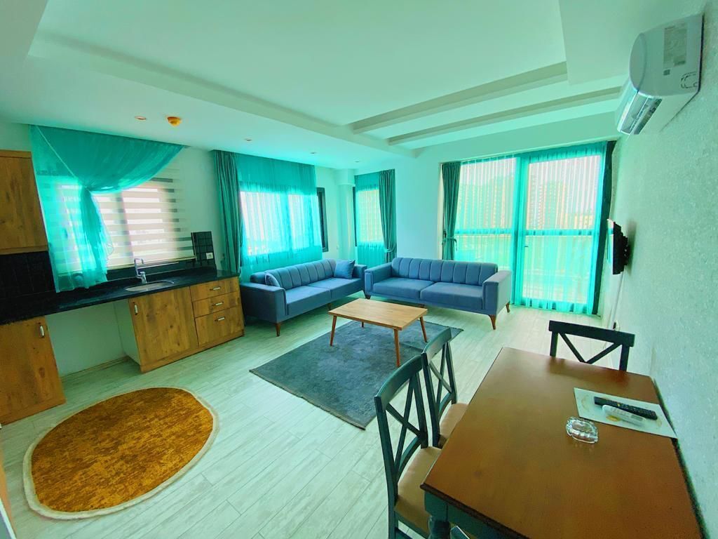 Condo superior | Área de estar | TV LCD