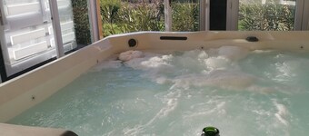 Le Gite du Moulin with its swimming pool, private spa and pétanque court. 