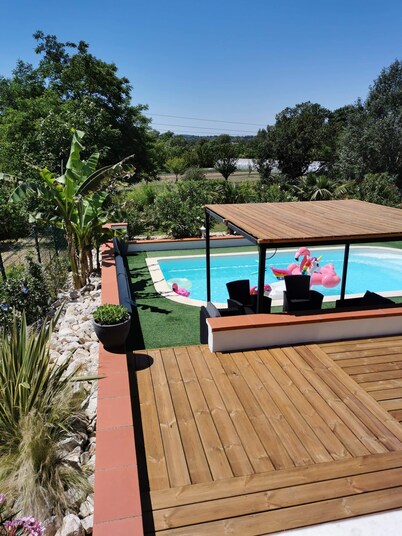 Le Gite du Moulin with its swimming pool, private spa and pétanque court.