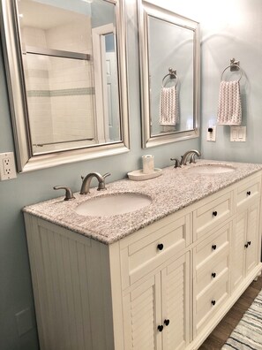 Combined shower/tub, hair dryer, towels, soap