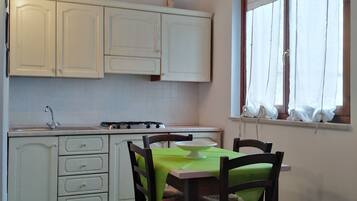 Apartment, Ground Floor | Private kitchen | Full-size fridge, cookware/dishes/utensils