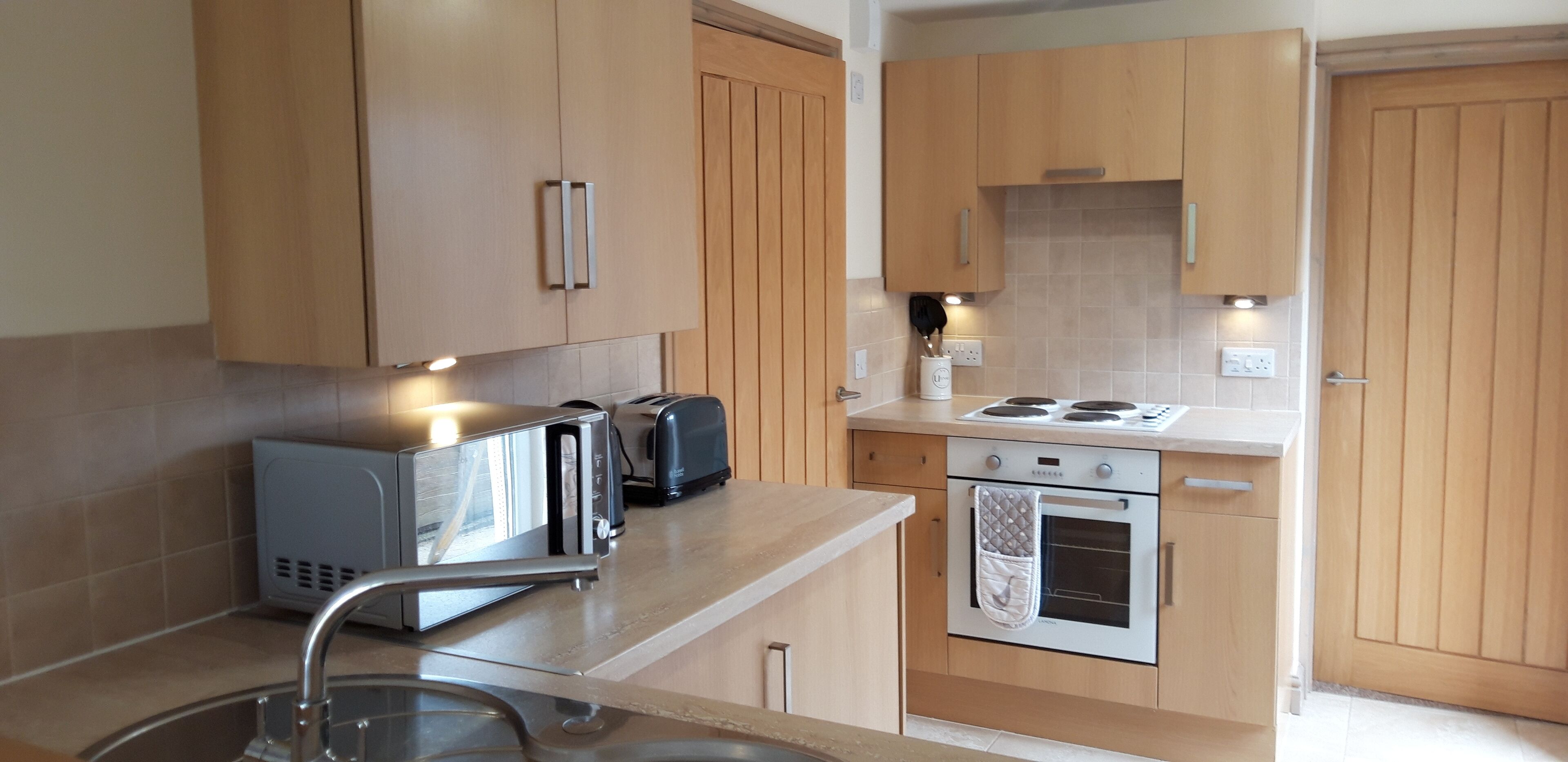 Apartemen Superior, akses difabel, kamar mandi pribadi | Dapur bersama