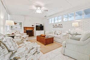 Smart TV, fireplace, books