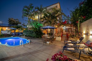 Outdoor pool, pool umbrellas, pool loungers