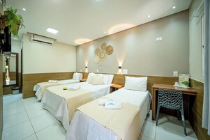 Minibar, laptop workspace, blackout curtains, iron/ironing board