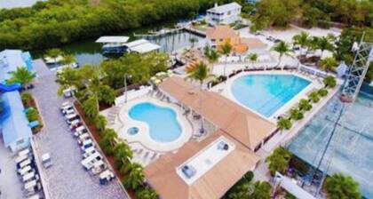 Near beach, includes golf cart , bikes , kayaks and pool , 5 stars. NCIC member