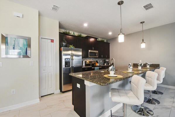 Condo, Multiple Beds (1578SW - The Retreat at ChampionsGate) | Private kitchen | Fridge, microwave, stovetop, dishwasher - 1578sw - The Retreat at Championsgate (Davenport)