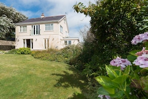 Sand Dollar from the enclosed rear garden, luxury five-bedroom upside-down holiday home sleeping eleven in Rhosneigr, Anglesey - Sand Dollar: family-friendly holiday home in Rhosneigr (Rhosneigr)
