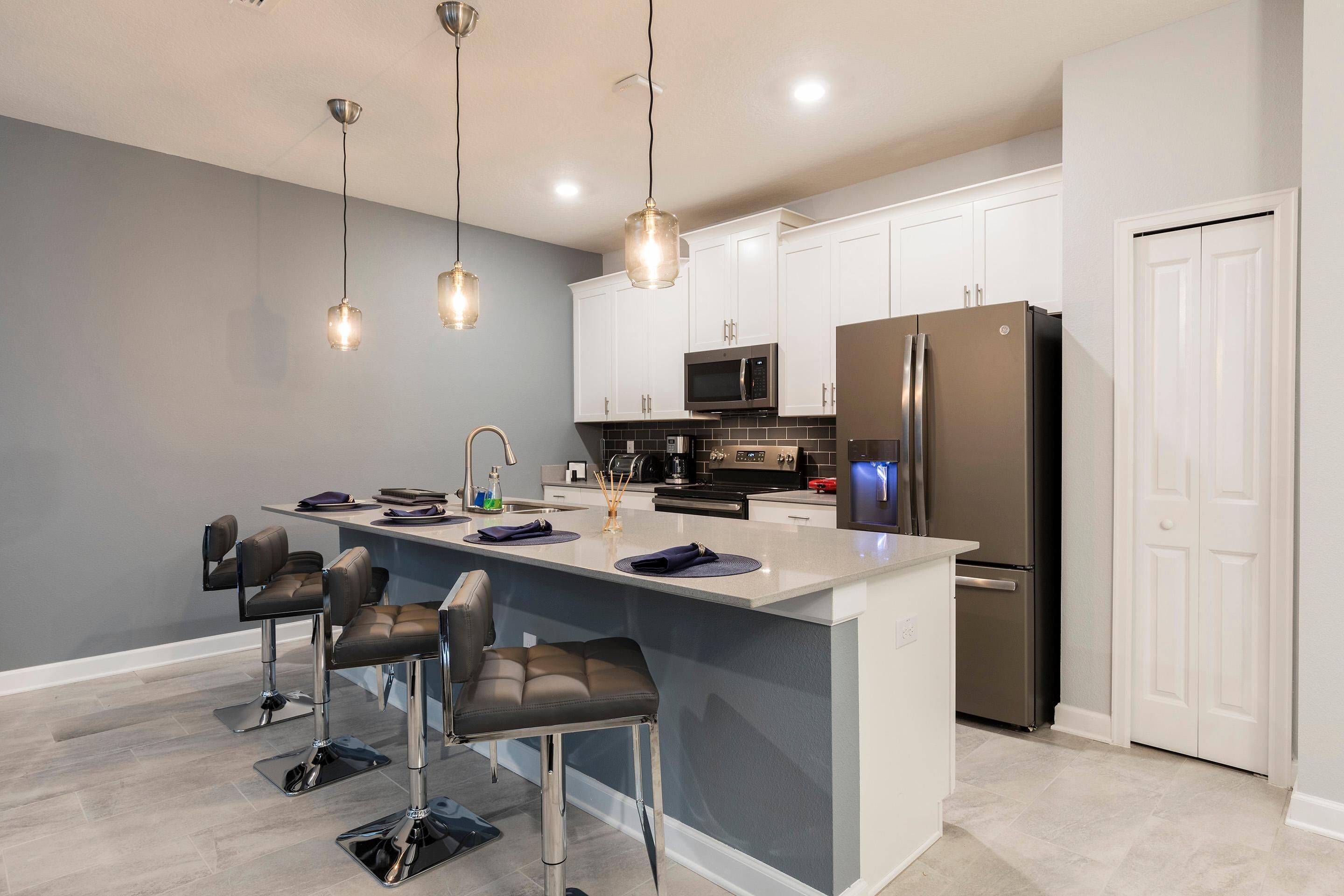 Casa de ciudad, varias camas (8919SID-The Retreat at ChampionsGate) | Cocina privada | Utensilios de cocina 